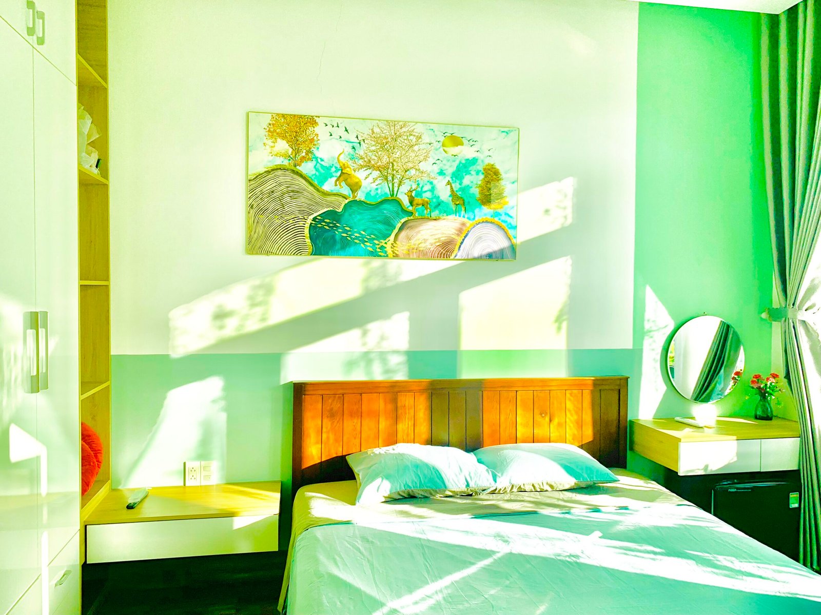 Garden-facing balcony seating in Garden Balcony King Room, Kalinh Homestay Hoi An