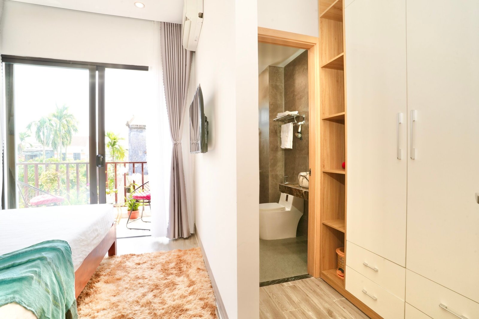 Private balcony view from Sunny Balcony King Room at Kalinh Homestay Hoi An